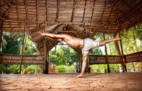Yoga warrior in Indian shala — Stock Photo, Image