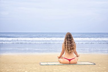 Meditation on the beach clipart