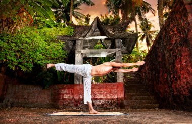 Yoga near temple clipart