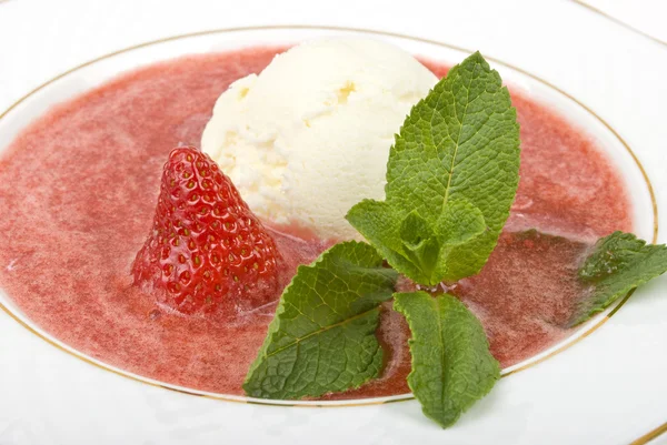 Ice-cream in a strawberry syrup — Stock Photo, Image