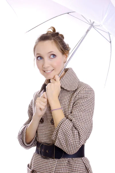 Młoda dziewczyna z parasolem na białym tle — Zdjęcie stockowe