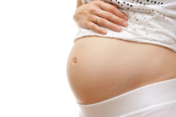 Obrázek těhotné ženy dotýkal její břicho s rukou — Stock fotografie