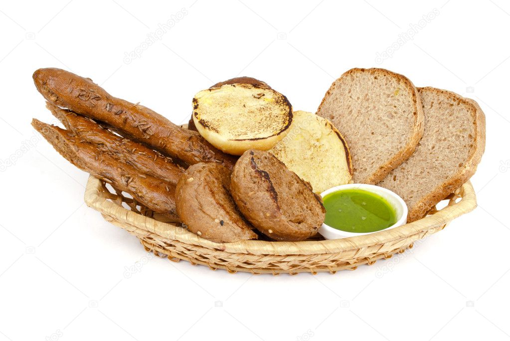 Tasty baked with ears of wheat, isolated on a white background