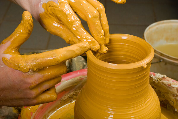Potter working at his workshop