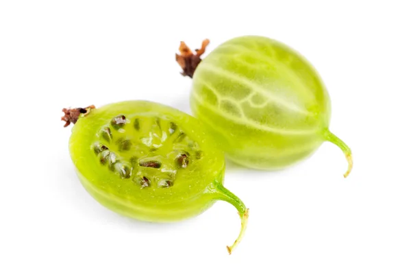 Whole and sliced green gooseberry fruit closeup with seed on white background — Stock Photo, Image