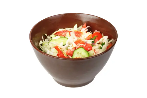 stock image Fresh salad with tomato, cabbage and cucumber on bowl isolated on white