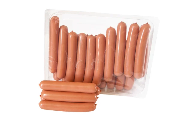 Salsichas de sabor de carne de pilha na embalagem — Fotografia de Stock