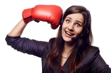 Pretty confident young woman with boxing gloves clipart