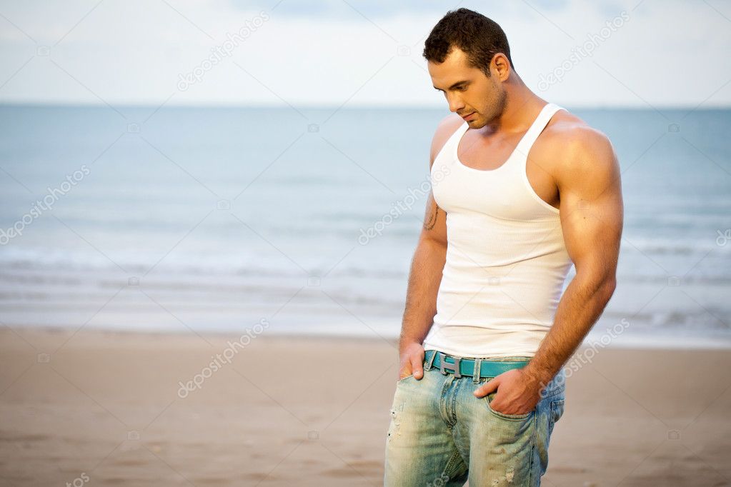 Young athlete on beach