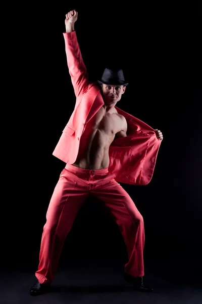 Sexy Mann im roten Anzug — Stockfoto