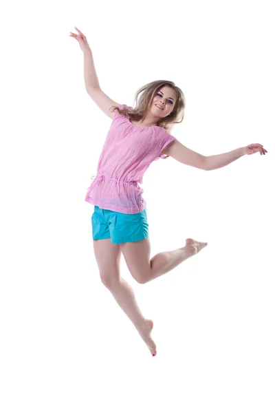 Szczęśliwa młoda kobieta skoki — Zdjęcie stockowe