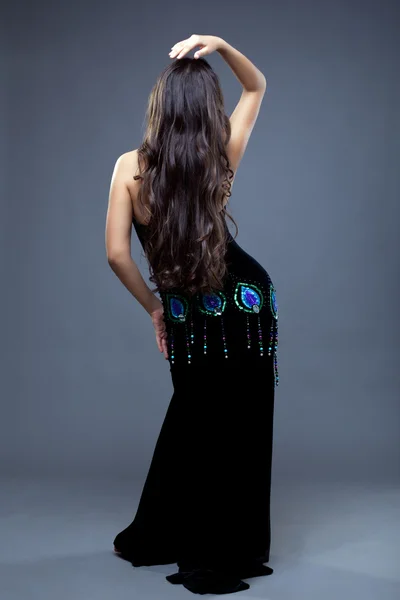 Beautiful oriental dancer with long hair — Stock Photo, Image