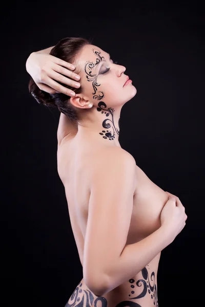 Pretty nude young woman with art makeup — Stock Photo, Image