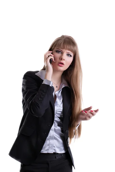 Удивлена, что деловая женщина разговаривает по мобильному телефону — стоковое фото