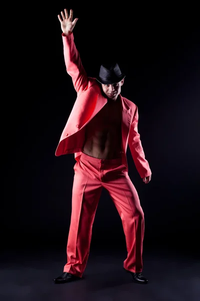 Kırmızı elbiseli seksi dansçı — Stok fotoğraf