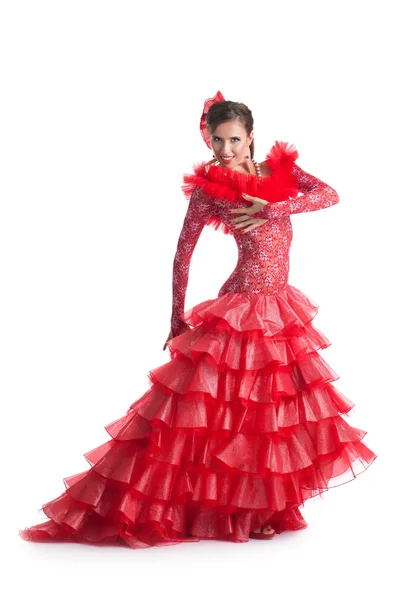 Молодая женщина в красном платье исполняет фламенко — стоковое фото
