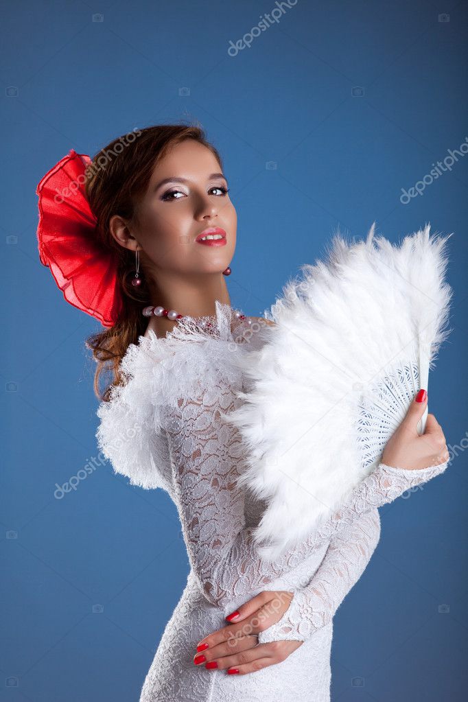 Beauty woman portrait in white flamenco costume