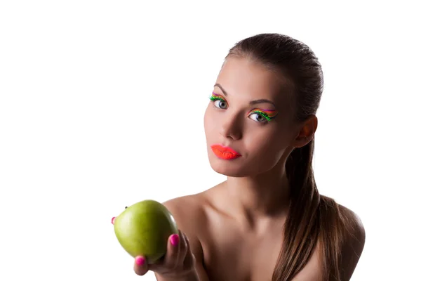 Pretty woman offer green apple with uv make-up — Stock Photo, Image