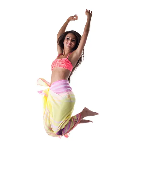 Pretty woman in swimsuit and cape happy jump — Stock Photo, Image