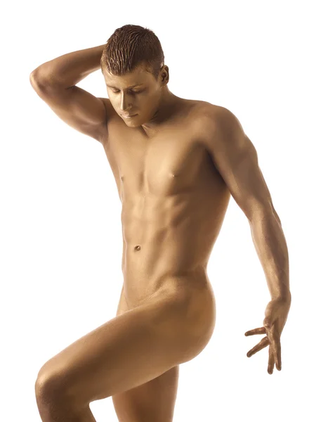 Homem atlético forte posando nu com pele de ouro — Fotografia de Stock