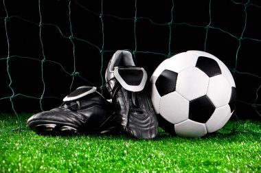 Soccer ball and cleats clipart