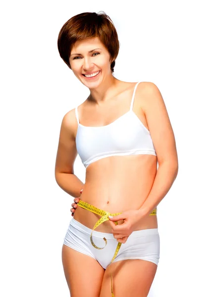 Pregnant woman measures her stomach — Stock Photo, Image