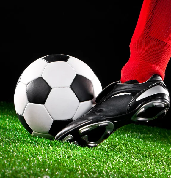 Soccer ball on the football field — Stock Photo, Image