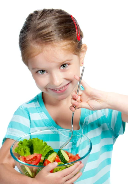 Linda niña con un plato de ensalada — Foto de Stock