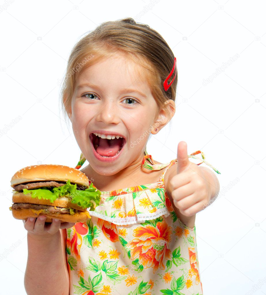 Little girl eating a sandwich isolated
