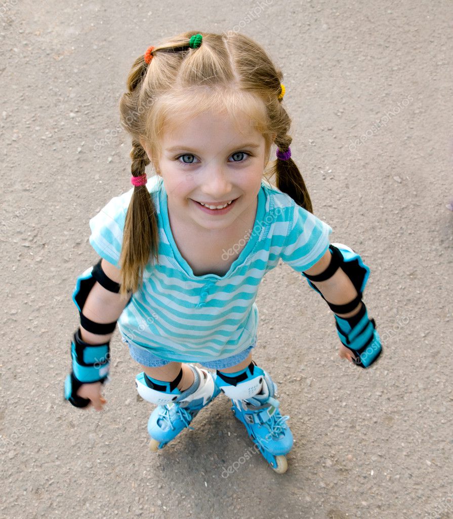 Girl on roller skates Stock Photo by ©GekaSkr 10881037