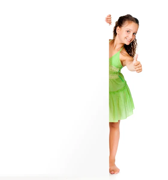 Kleines Mädchen gegen einen weißen Rohling — Stockfoto
