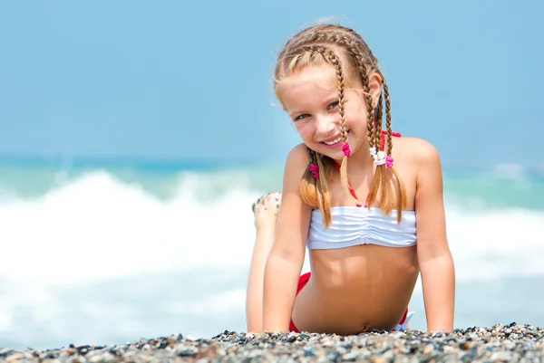 Obličej krásné dívky na pláži — Stock fotografie