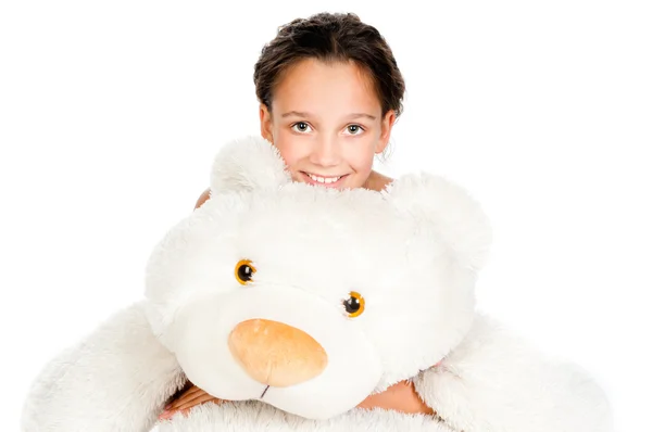 Красивая маленькая девочка с игрушечным медведем — стоковое фото