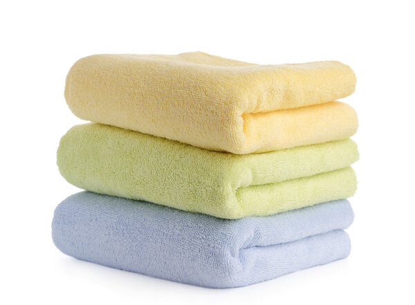 Stack of towels isolated on white