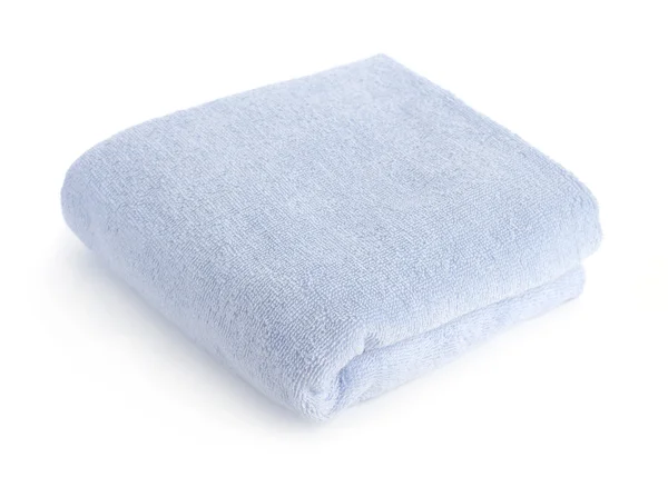 En blå handduk isolerad på vit — Stockfoto