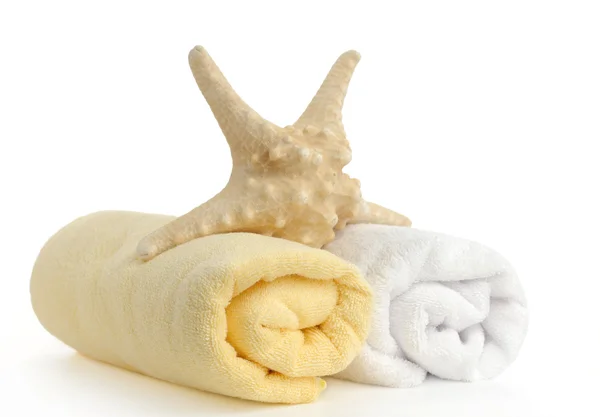 Rolled up yellow and white beach towels — Stock Photo, Image