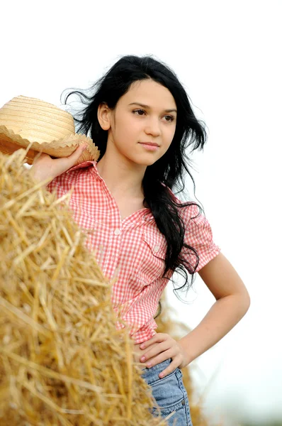 Beautiful girl enjoying the nature in the hay — Stock Photo, Image