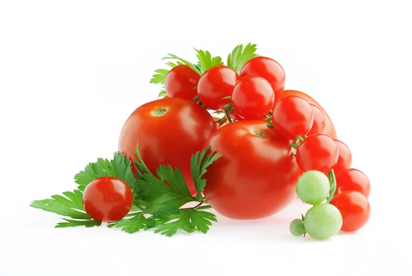 Pomodori freschi e prezzemolo isolato — Foto Stock