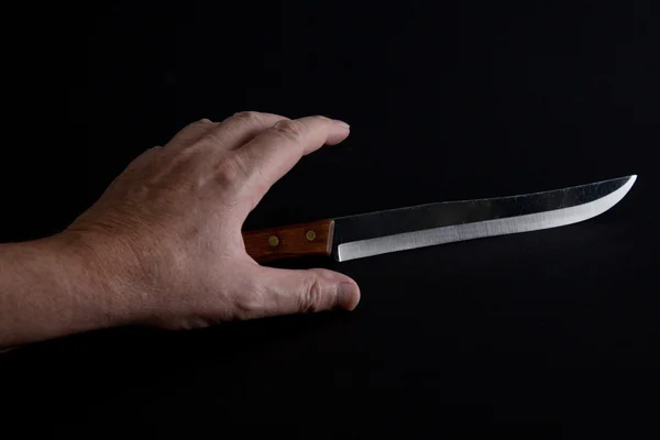 Stock image Knife and hand