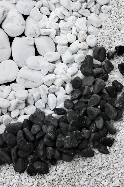 White and black pebble stones — Stock Photo, Image