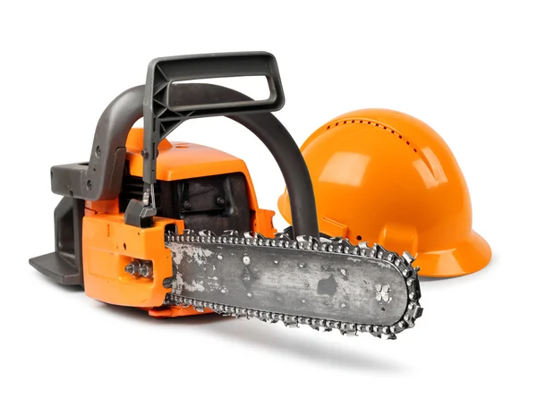 Chain saw and safety helmet — Stock Photo, Image