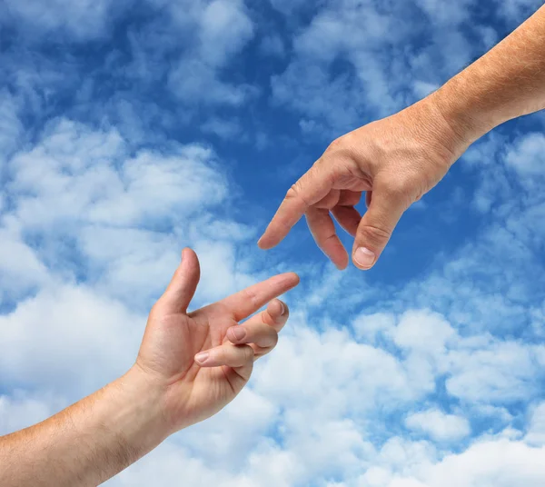 Two hands reaching each other — Stock Photo, Image
