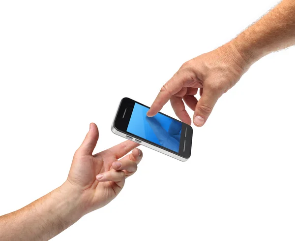 Twee handen bereiken smartphone — Stockfoto