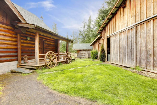 Log house exterior and shed. — Stock Photo, Image