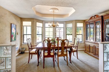 Elegant dining room with antique furniture. clipart