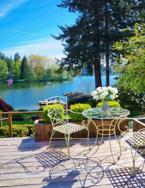 Beautiful deck with lake view and spring landscape. — Stock Photo, Image