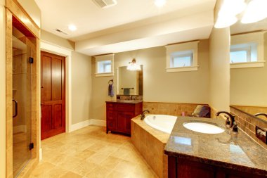 Large bathroom interior with high end quality. clipart