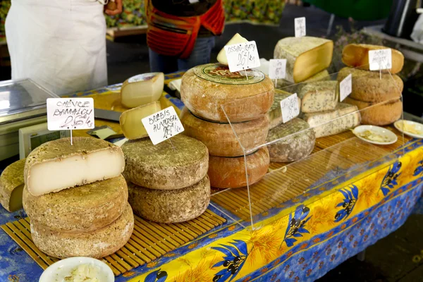 Stock image Italian market cheese stand.