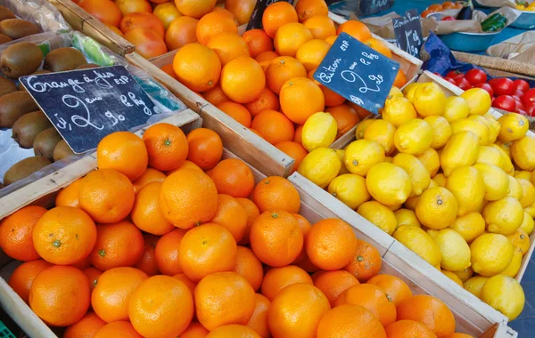 stock image Citrus oranges and lemons on the market in France.