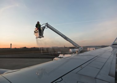 De-Icing an Airplane clipart